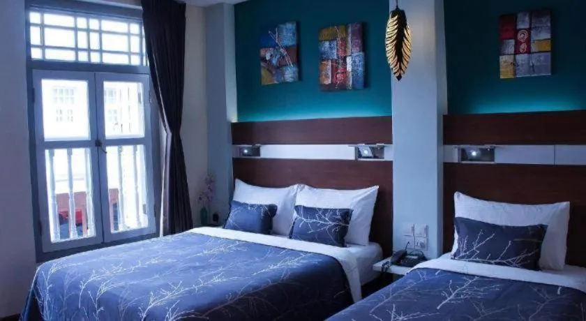 Bed in The Keong Saik Hotel