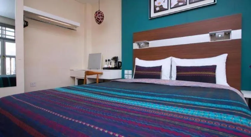 Bed in The Keong Saik Hotel