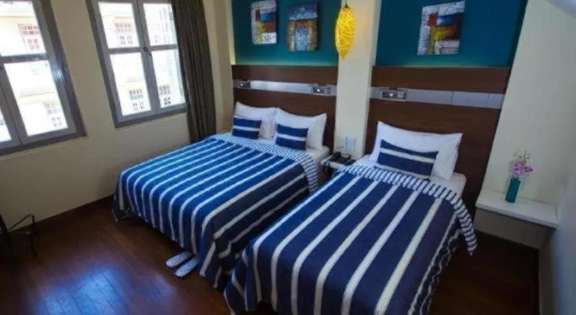 Bed in The Keong Saik Hotel