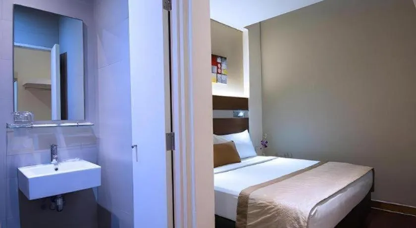 Bed in The Keong Saik Hotel