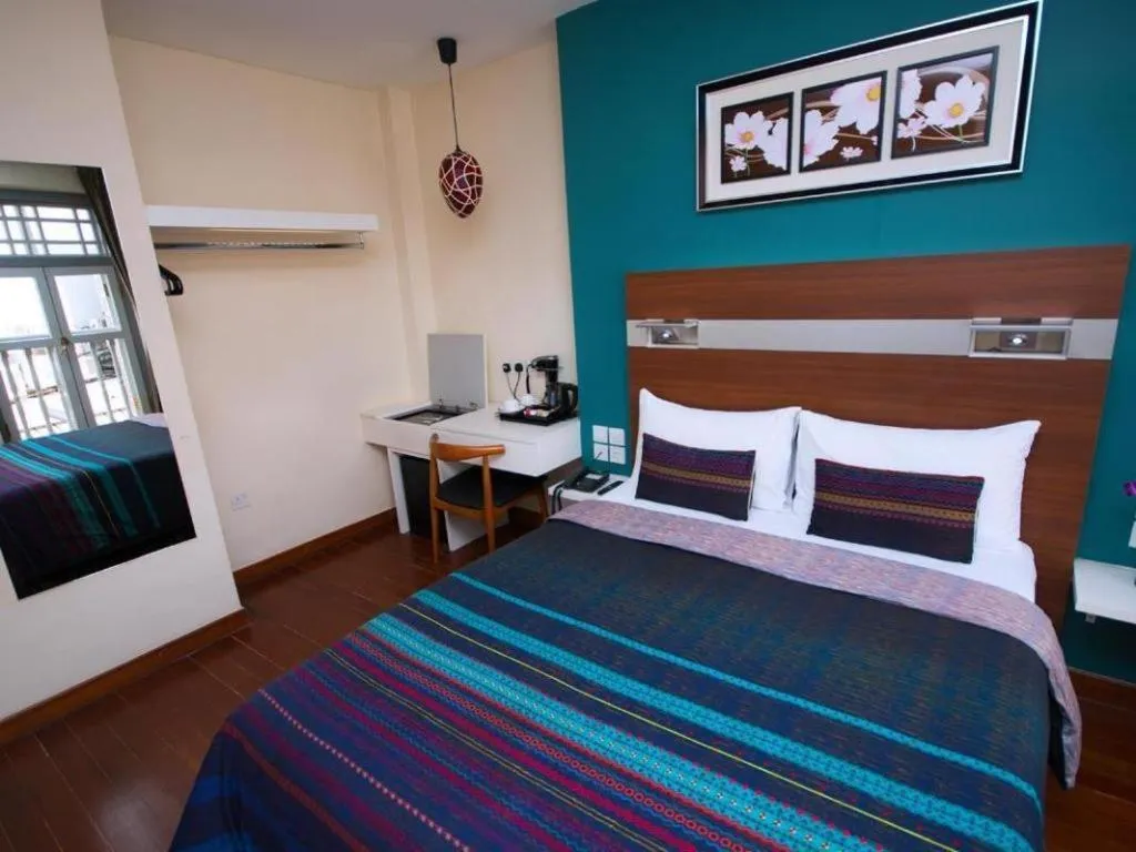 Bed in The Keong Saik Hotel