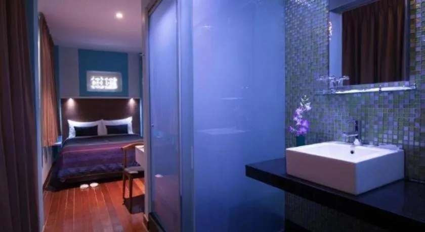 Bed in The Keong Saik Hotel