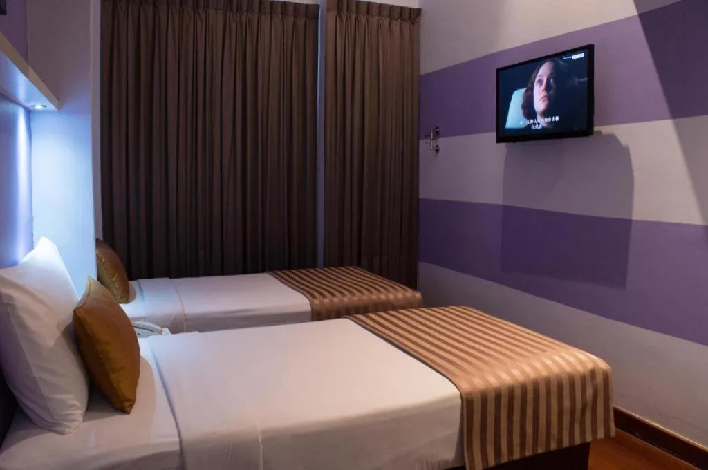 Bed in The Keong Saik Hotel