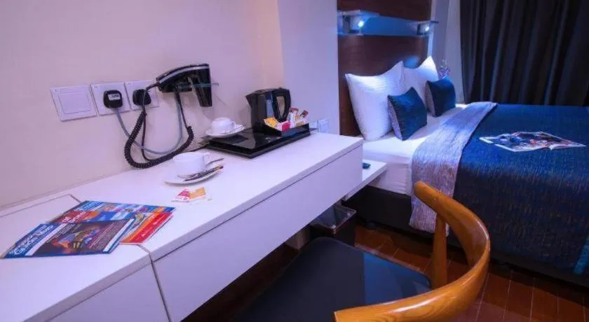 Bed in The Keong Saik Hotel