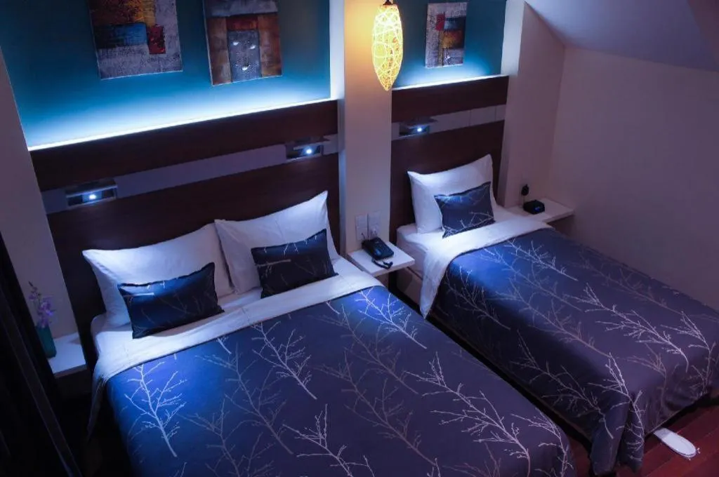 Bed in The Keong Saik Hotel