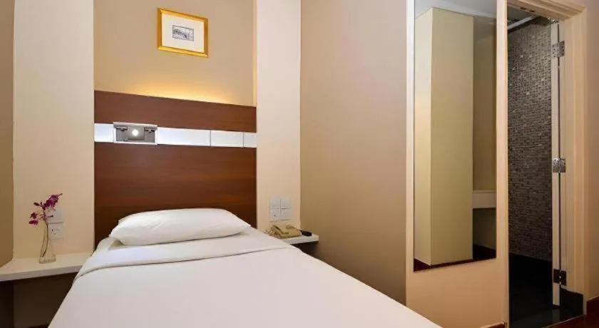 Bed in The Keong Saik Hotel