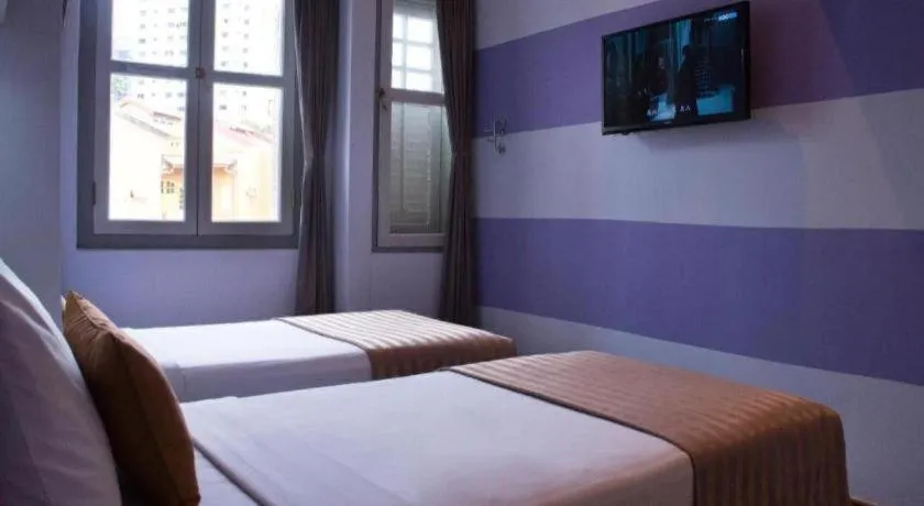 Bed in The Keong Saik Hotel