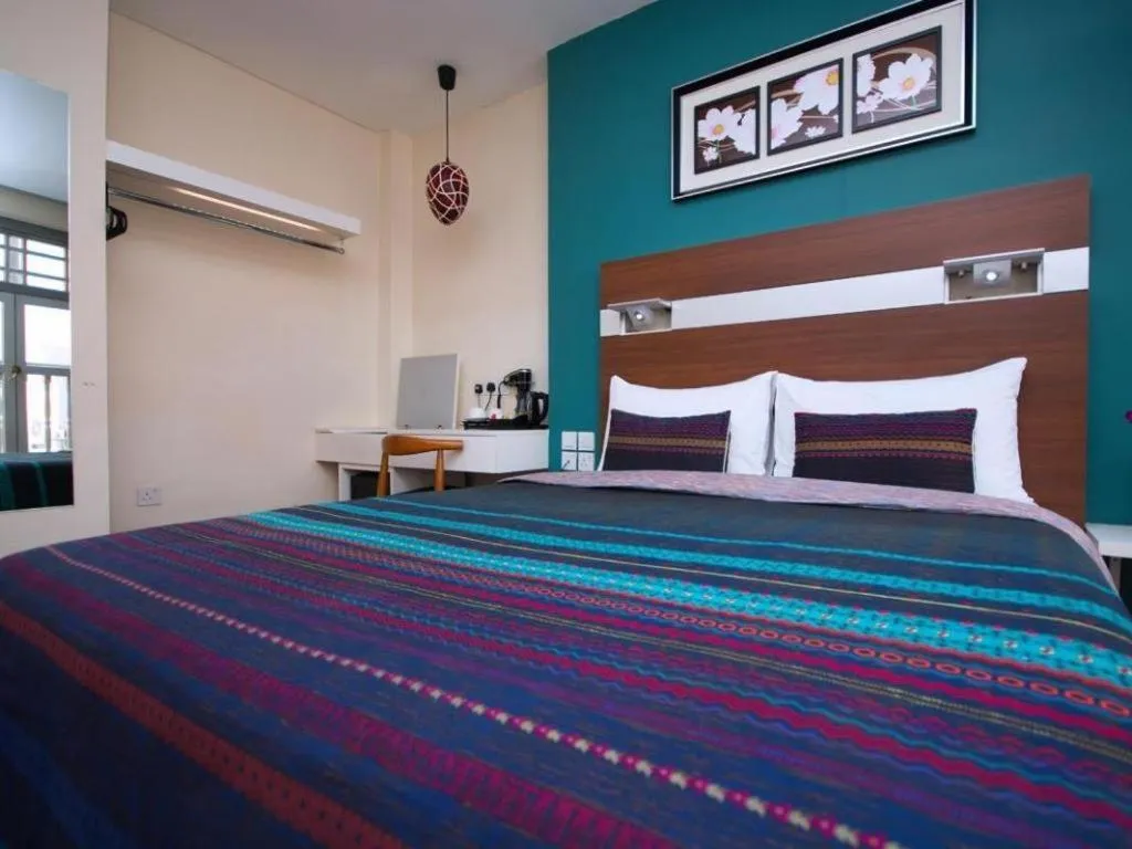 Bed in The Keong Saik Hotel