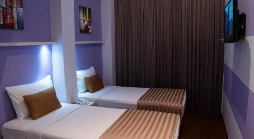 Bed in The Keong Saik Hotel