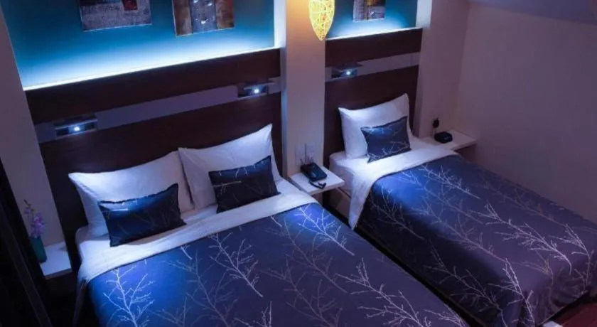 Bed in The Keong Saik Hotel