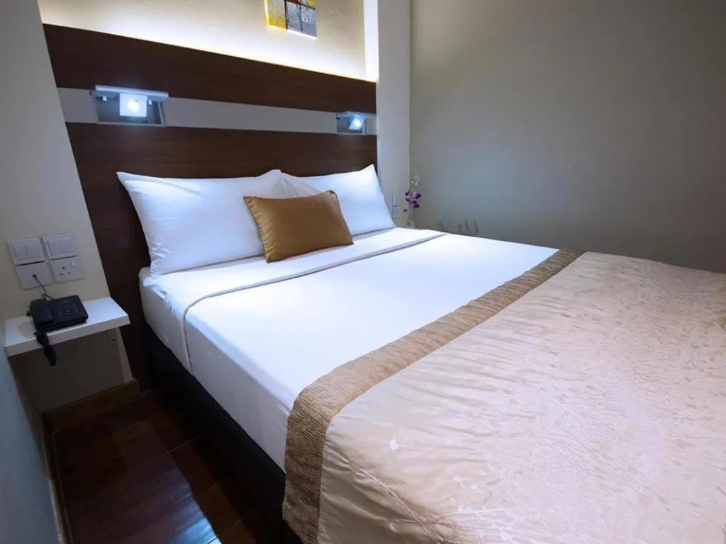 Bed in The Keong Saik Hotel