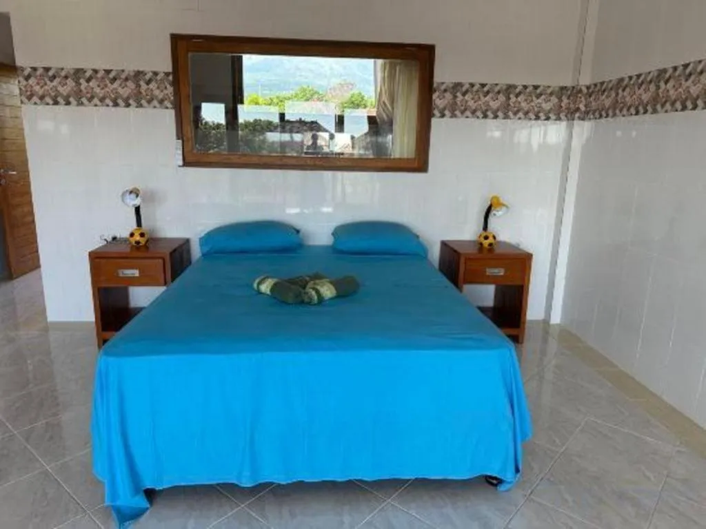 Bed in Tulamben Wreck Divers Resort & Restaurant
