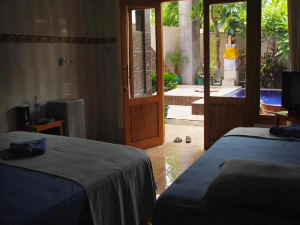 Bed in Tulamben Wreck Divers Resort & Restaurant