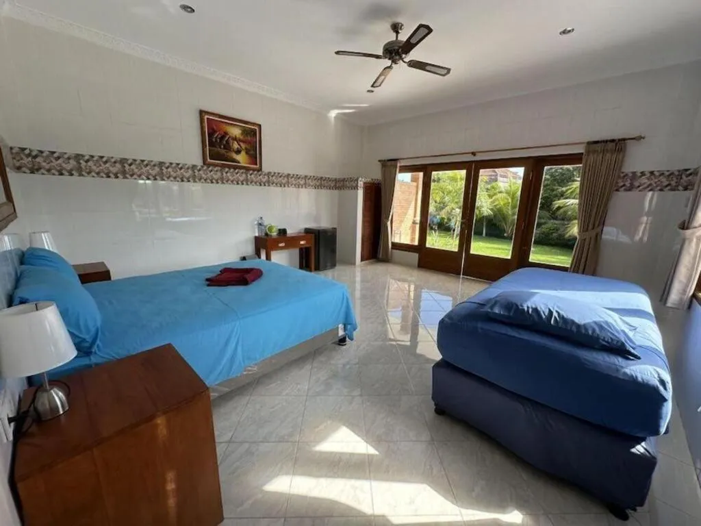 Bed in Tulamben Wreck Divers Resort & Restaurant