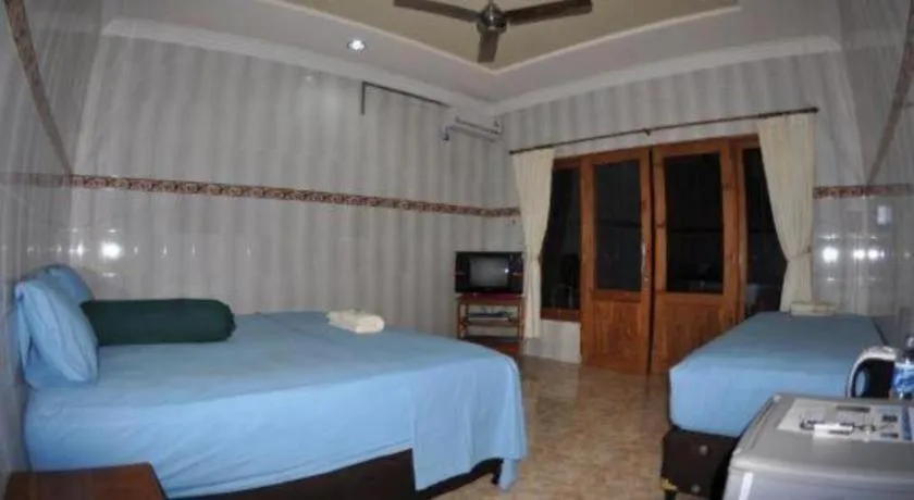 Bed in Tulamben Wreck Divers Resort & Restaurant