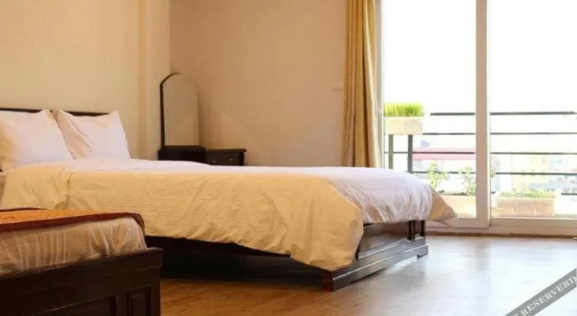 Bed in Dom's Residence & Hotel Hanoi