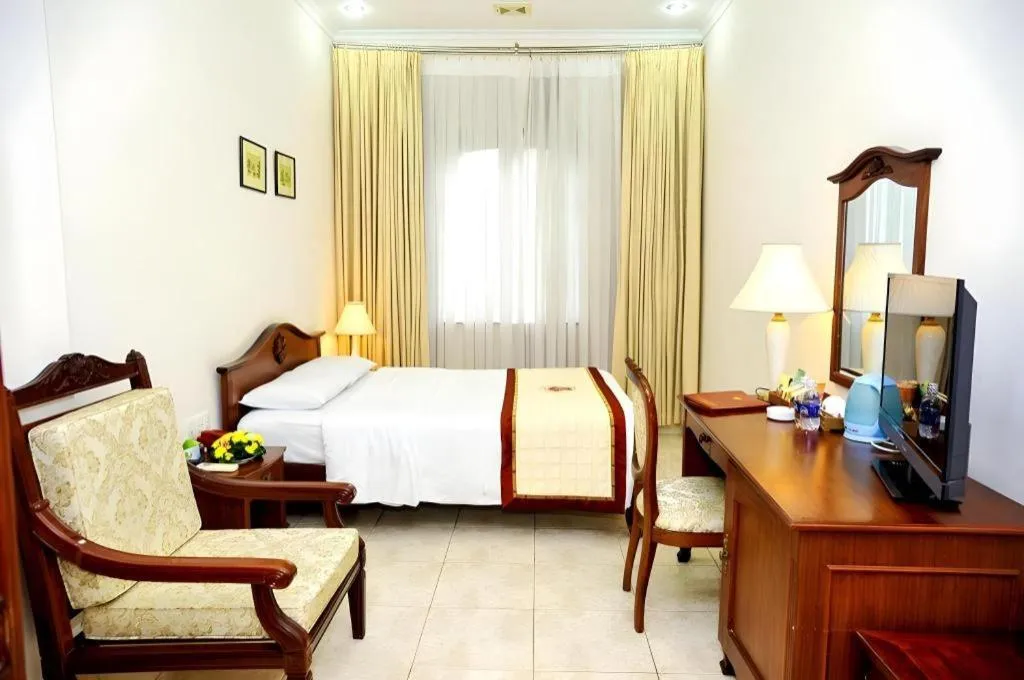 Bed in Tan Son Nhat Hotel