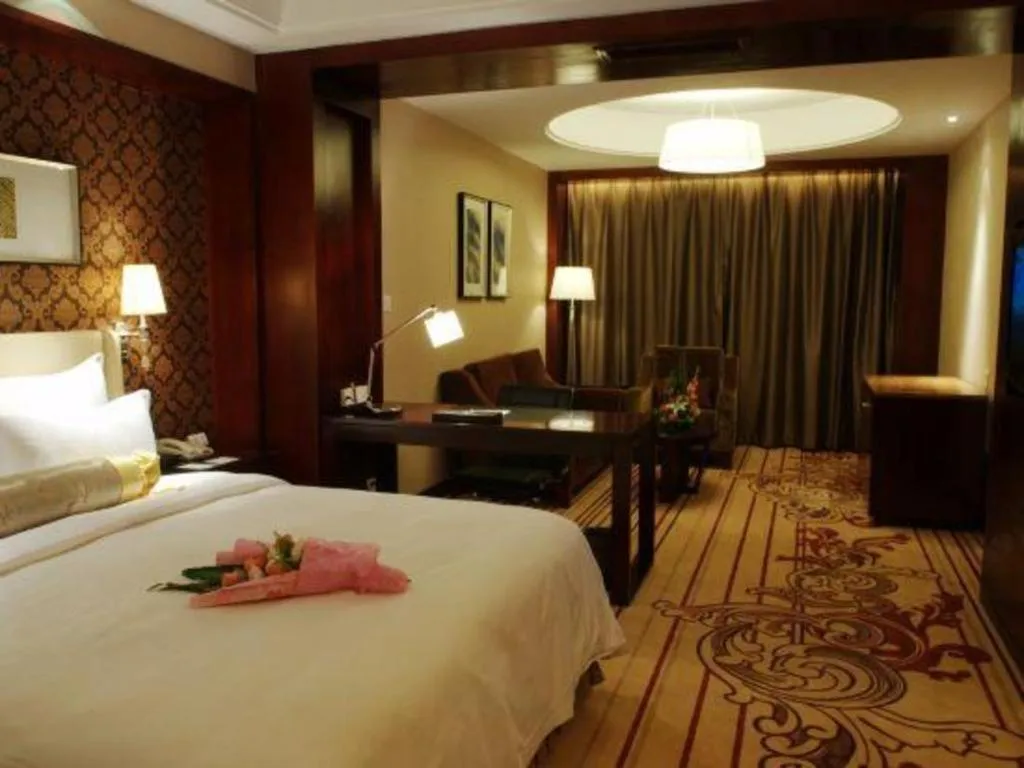 Bed in Yiwu Shinsun International Hotel