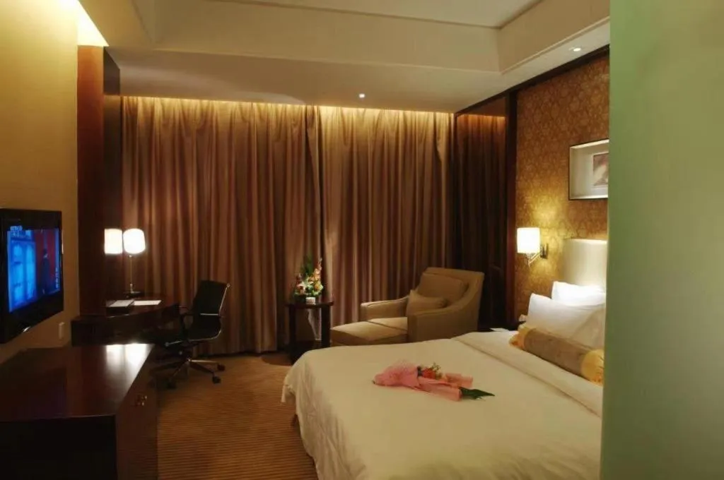 Bed in Yiwu Shinsun International Hotel