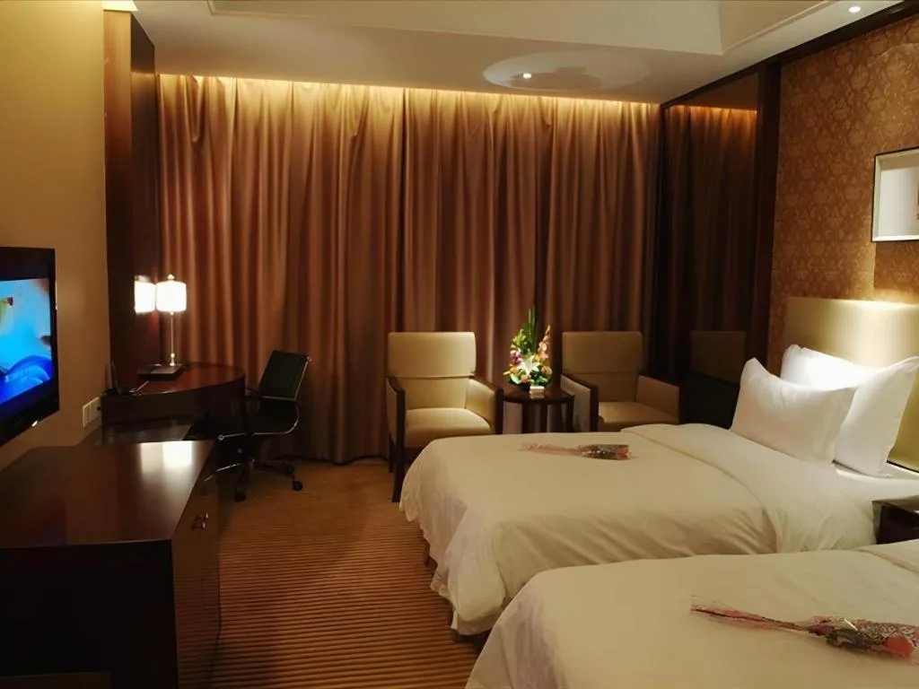 Bed in Yiwu Shinsun International Hotel