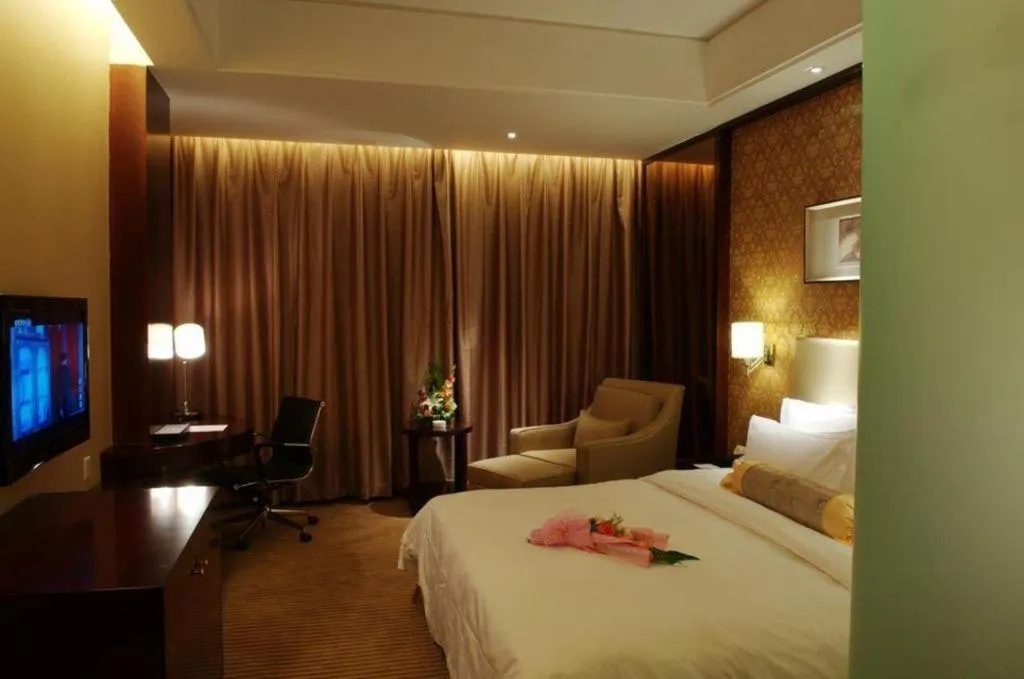 Bed in Yiwu Shinsun International Hotel