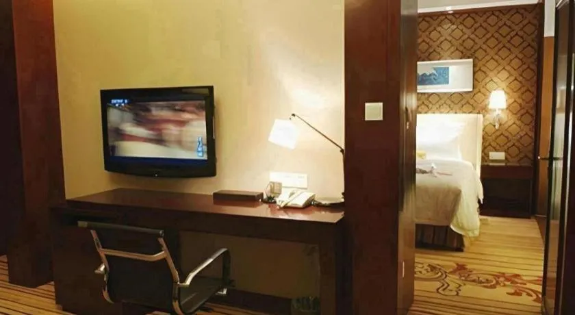 Bed in Yiwu Shinsun International Hotel