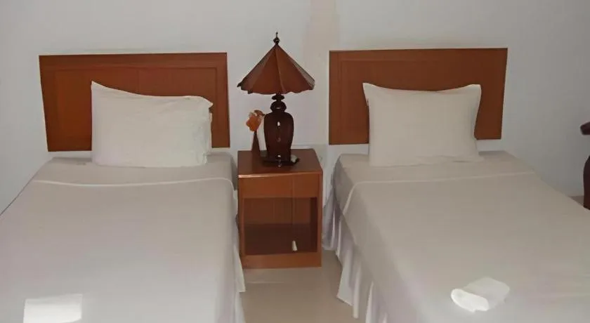 Bed in Ranong Resort & Laguna
