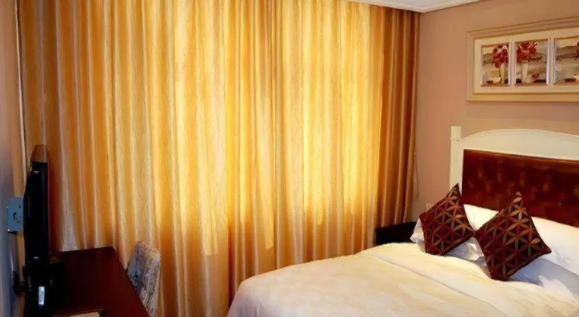 Bed in Hangzhou Silver Star Hotel