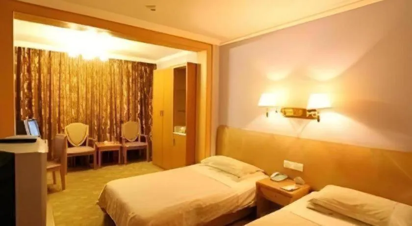 Bed in Hangzhou Silver Star Hotel