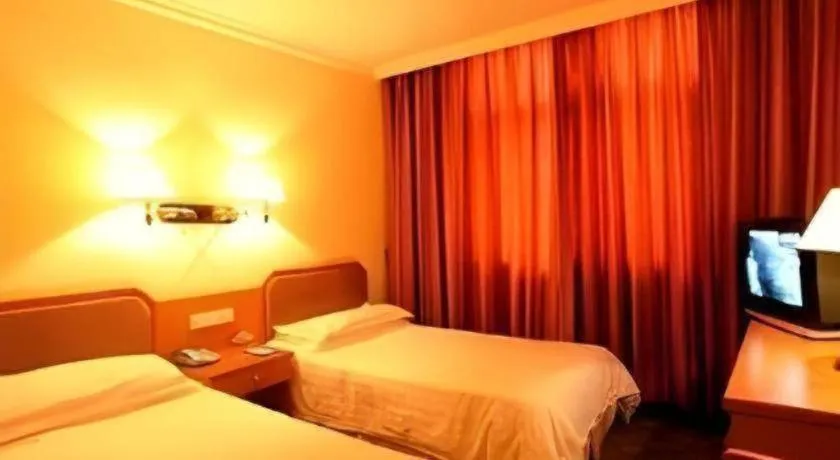 Bed in Hangzhou Silver Star Hotel