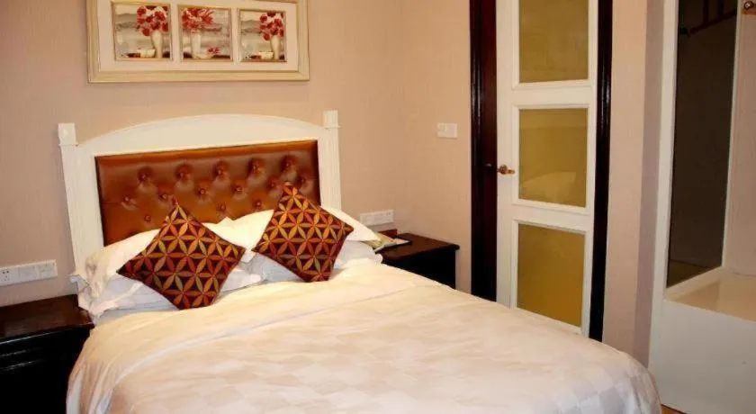 Bed in Hangzhou Silver Star Hotel