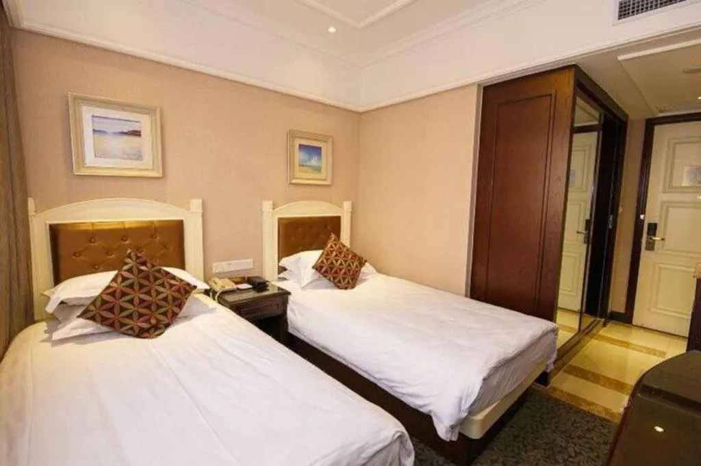 Bed in Hangzhou Silver Star Hotel