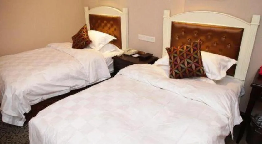 Bed in Hangzhou Silver Star Hotel