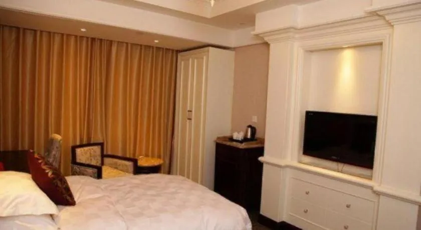 Bed in Hangzhou Silver Star Hotel