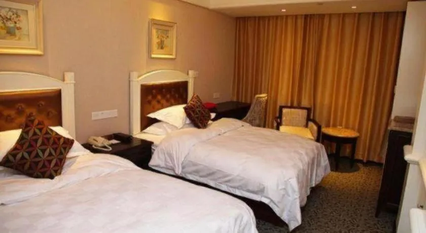 Bed in Hangzhou Silver Star Hotel