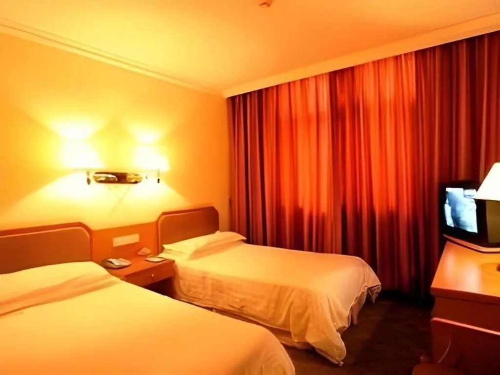 Bed in Hangzhou Silver Star Hotel