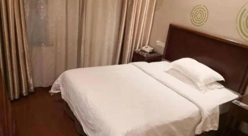 Bed in GreenTree Alliance Changzhou University City Hotel