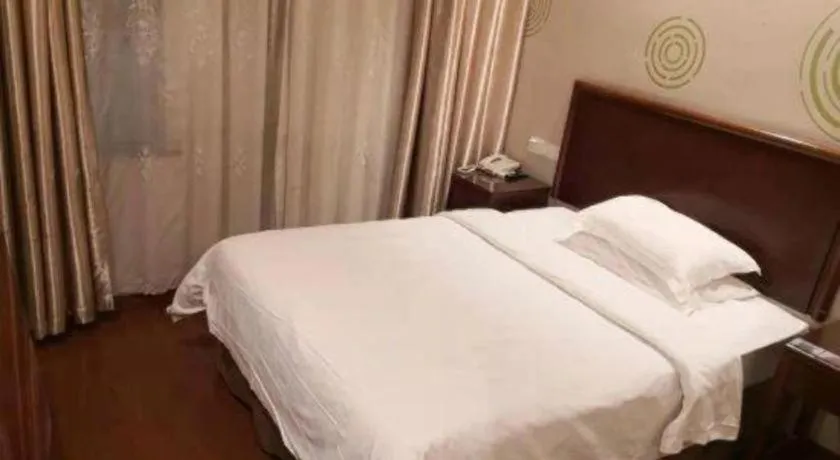 Bed in GreenTree Alliance Changzhou University City Hotel