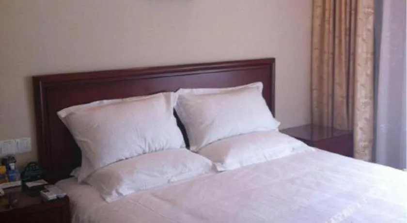 Bed in GreenTree Alliance Changzhou University City Hotel