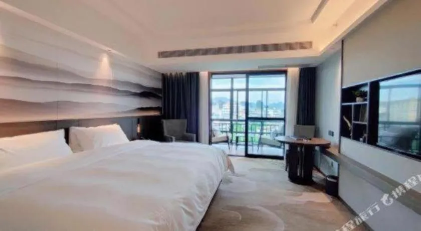 Bed in Vienna Hotel Guangxi Guilin 7-Star Wanda Plaza
