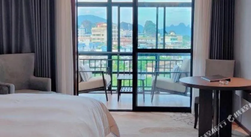 Bed in Vienna Hotel Guangxi Guilin 7-Star Wanda Plaza