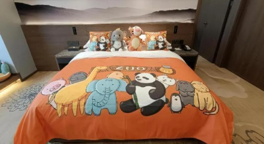 Bed in Vienna Hotel Guangxi Guilin 7-Star Wanda Plaza