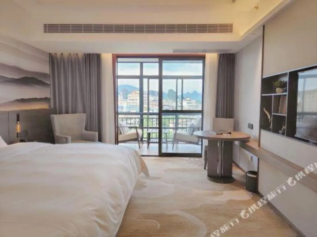 Bed in Vienna Hotel Guangxi Guilin 7-Star Wanda Plaza