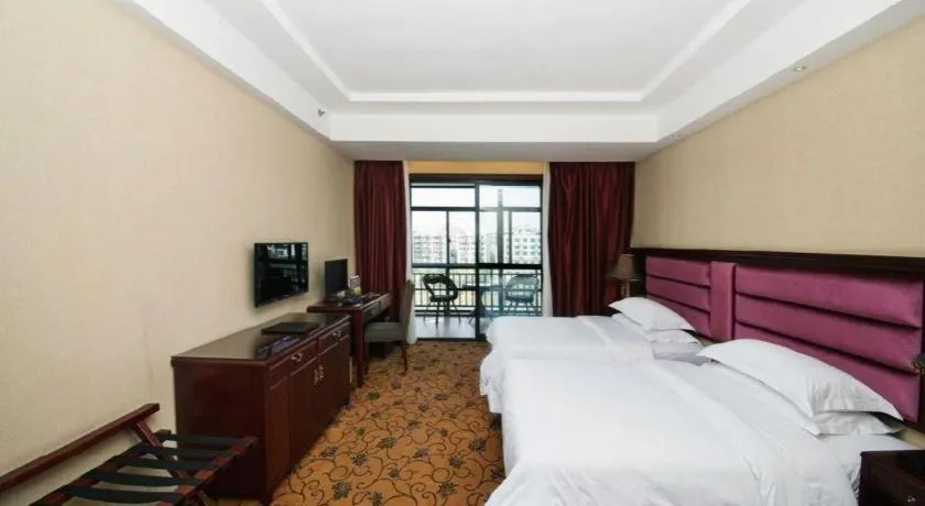 Bed in Vienna Hotel Guangxi Guilin 7-Star Wanda Plaza