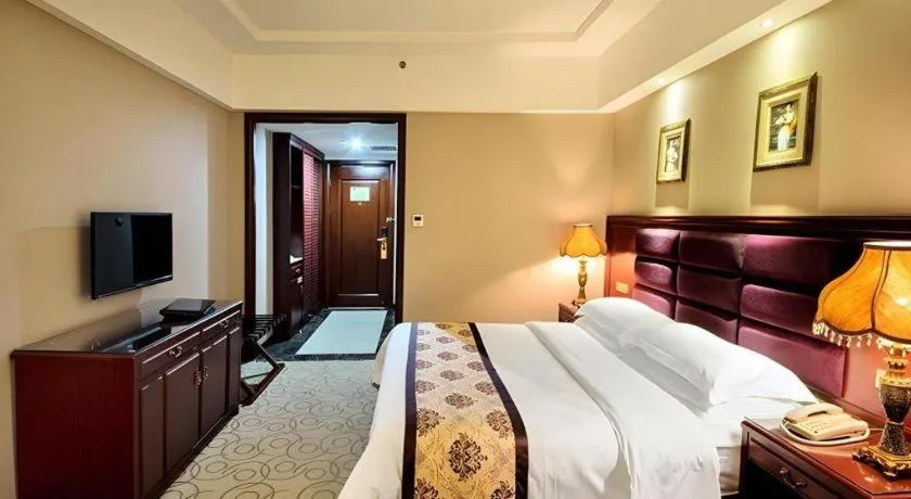Bed in Vienna Hotel Guangxi Guilin 7-Star Wanda Plaza
