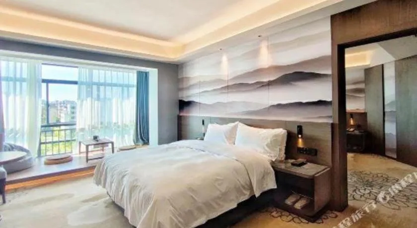Bed in Vienna Hotel Guangxi Guilin 7-Star Wanda Plaza