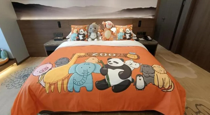 Bed in Vienna Hotel Guangxi Guilin 7-Star Wanda Plaza