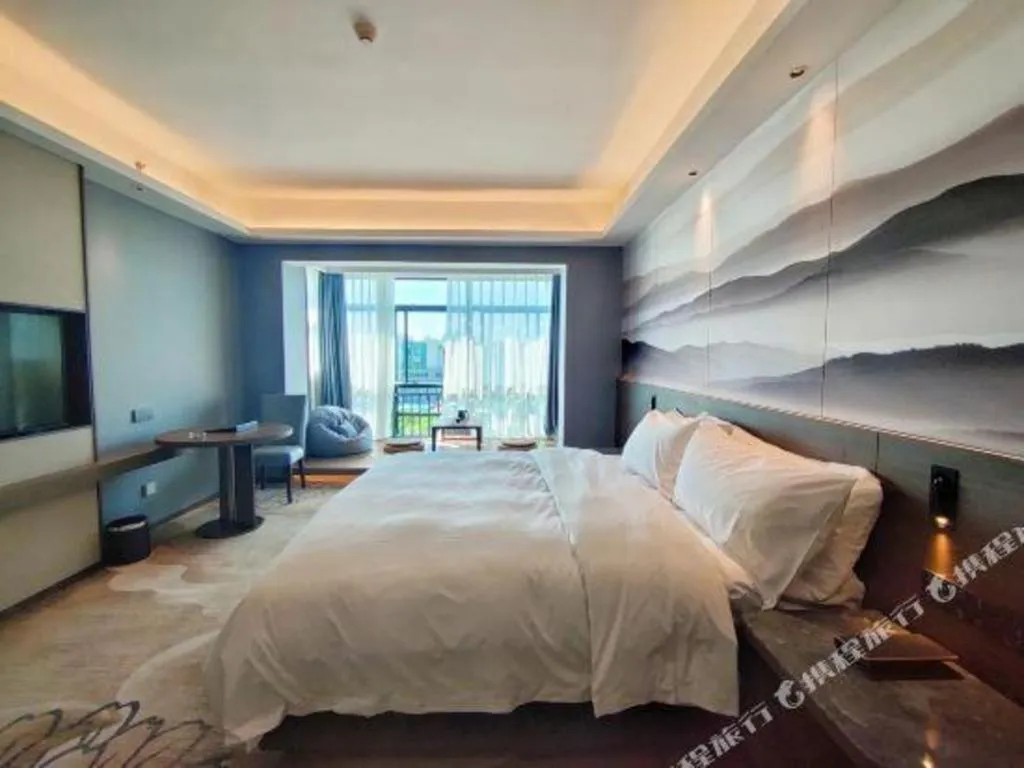 Bed in Vienna Hotel Guangxi Guilin 7-Star Wanda Plaza