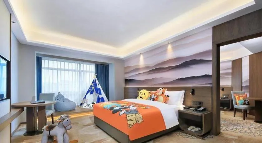 Bed in Vienna Hotel Guangxi Guilin 7-Star Wanda Plaza