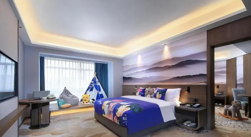 Bed in Vienna Hotel Guangxi Guilin 7-Star Wanda Plaza